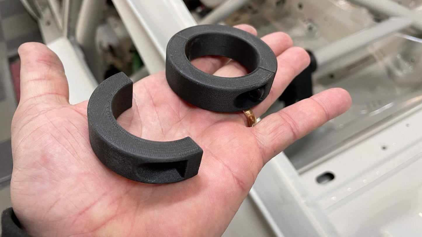 Harness retaining rings in hand